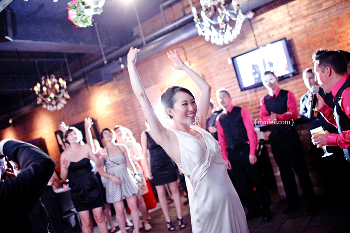 Bouquet toss at Brix wedding
