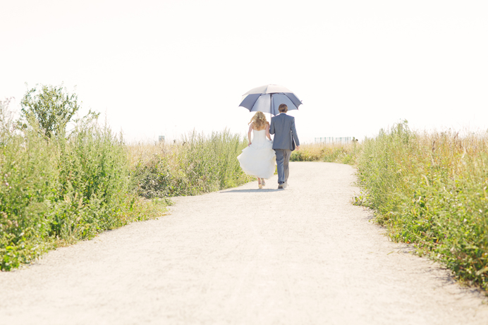 ubc vancouver wedding couple walking away ubc vancouver wedding couple walking away
