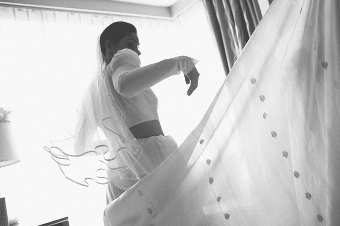 Bride putting on a sari before the wedding Tea House in Stanley Park Wedding on New Years Day | Linnie + Nico