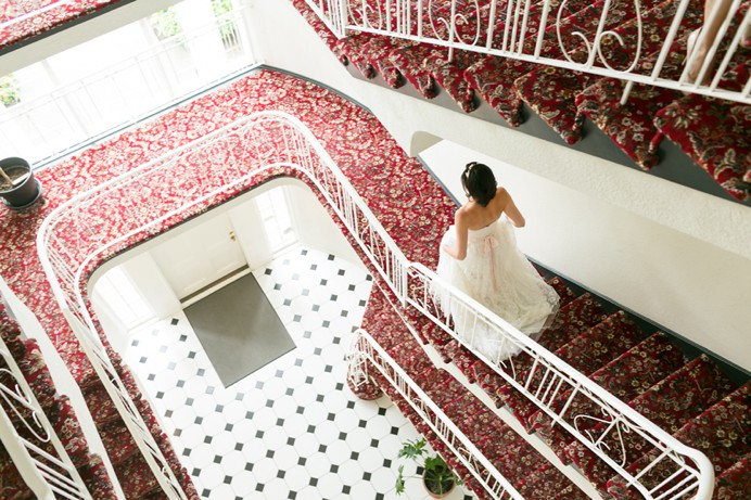 Bride walks down stairs