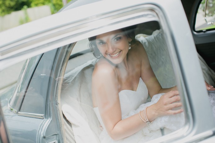 Bride in vintage car