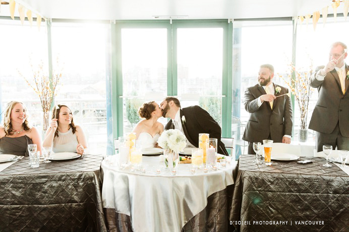 kiss at wedding reception False Creek Yacht Club